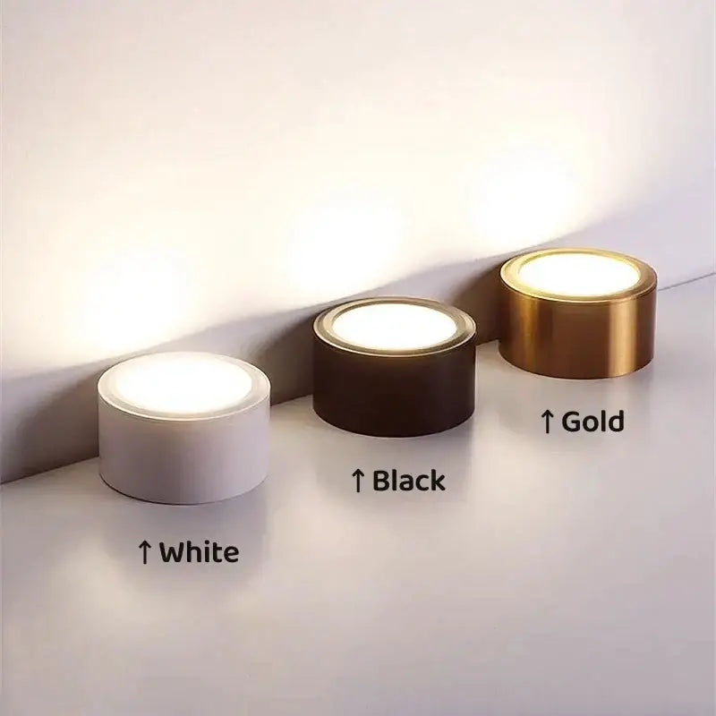 Three cylindrical led floor lamps in white black and gold finishes complement decorbites antique gold led ceiling downlights