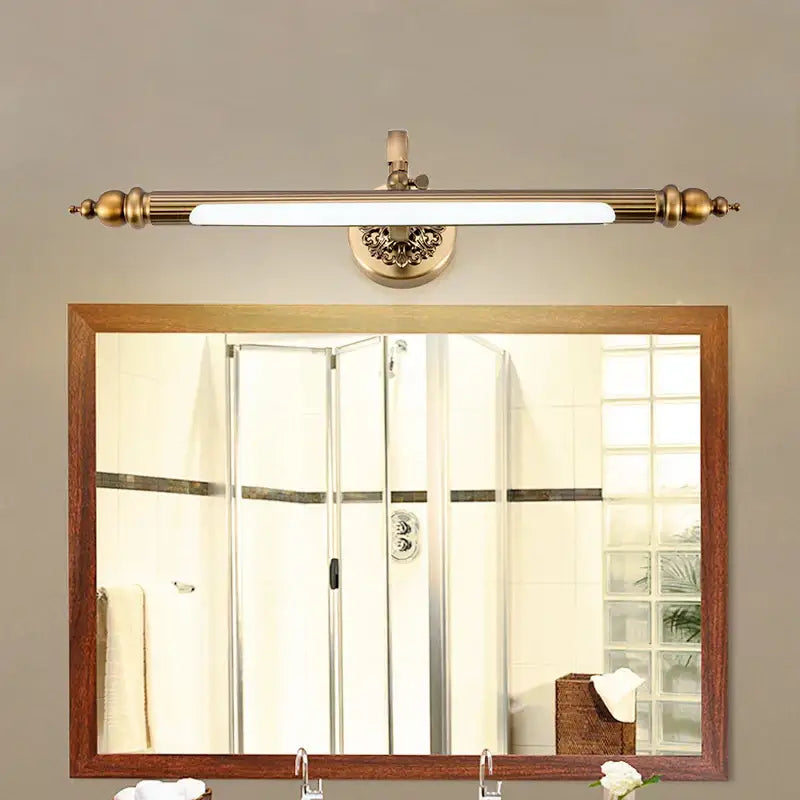 Decorbites antique golden bronze mirror lamp with antique golden brass finish and ornate detailing for bedroom wall lighting