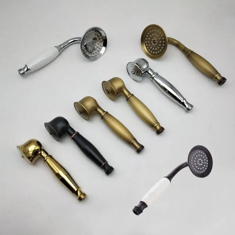 A collection of decorbites antique handheld shower head holders in brass chrome and black finishes for versatile use