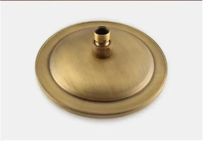 Brass-colored circular base with central threaded fitting for DecorBites antique shower head holder stand