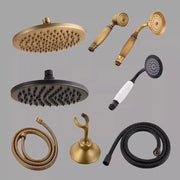 Decorbites antique handheld shower head set in antique brass and matte black with matching hoses and wall-mounted holder