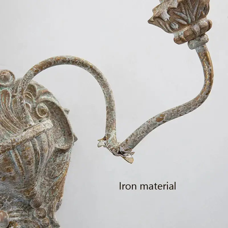 DecorBites antique iron double wall lamp with ornate leaf detailing and weathered patina for bedroom and corridor