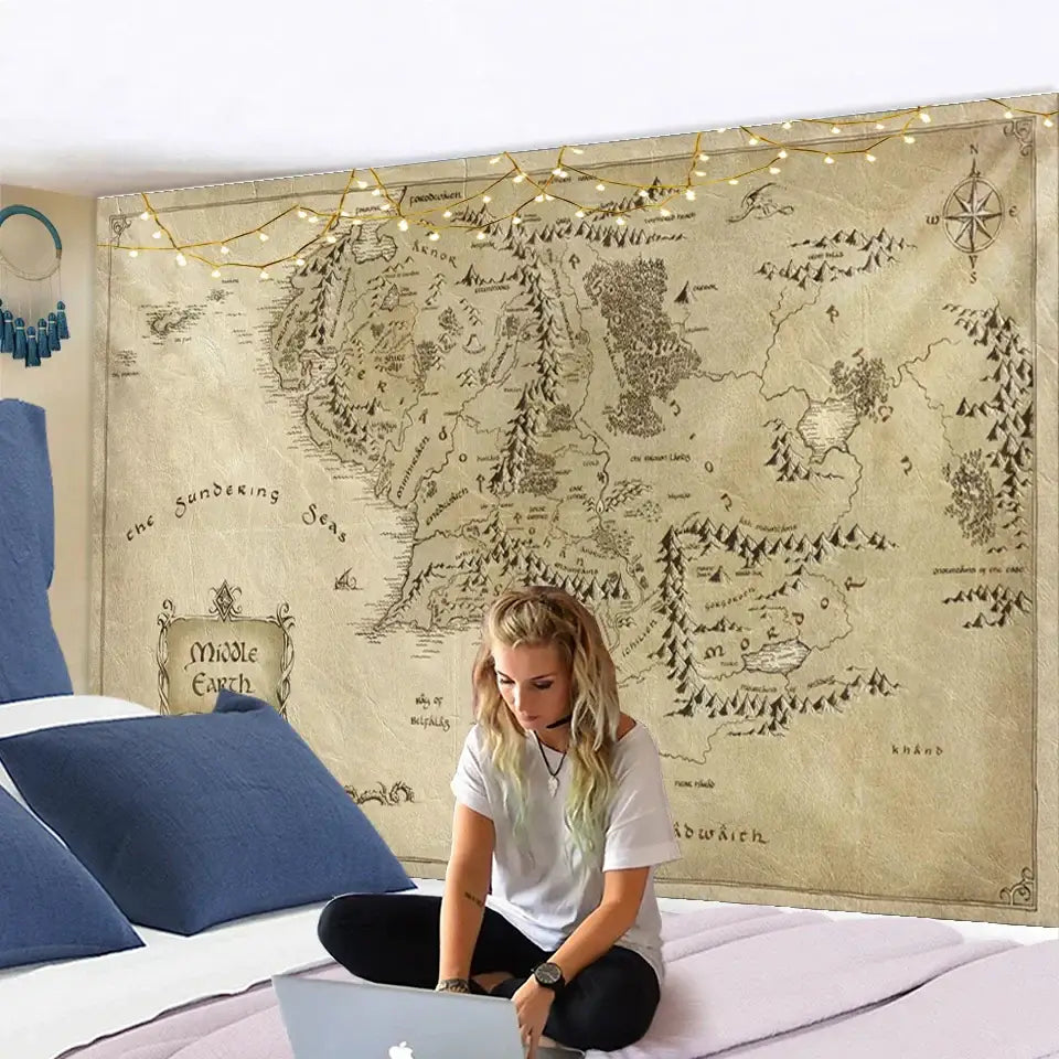 Vintage-style beige fabric tapestry featuring a detailed black ink middle earth map with string lights, perfect antique pirate treasure decor