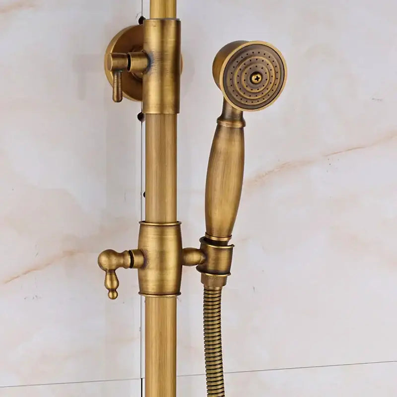 Antique brass-finished shower mixer tap set with handheld nozzle vertical rail and 8 inch rainfall shower head by decorbites