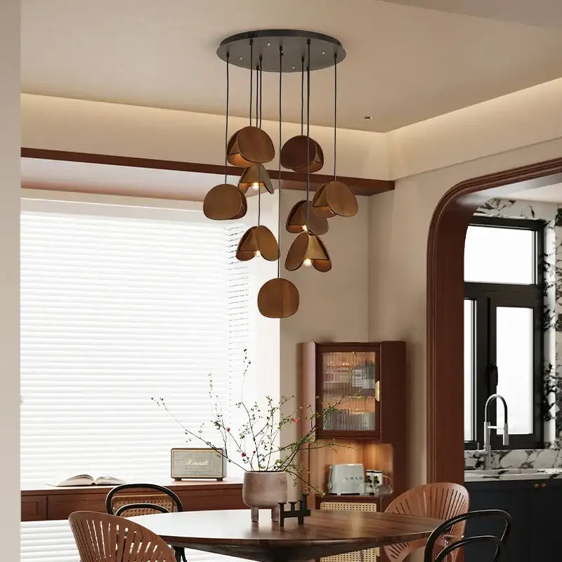 Decorbites antique style pendant light with modern bronze tones and solid wood disc-shaped shades for living room lighting