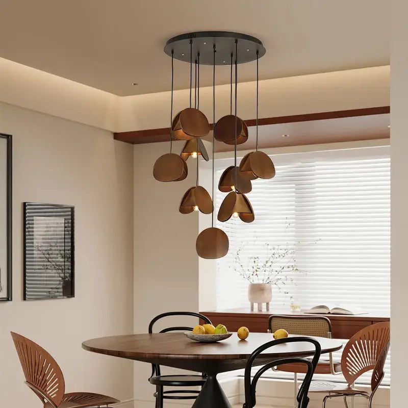 Modern bronze-toned pendant light with circular overlapping disc shades for DecorBites antique style solid wood retro lighting