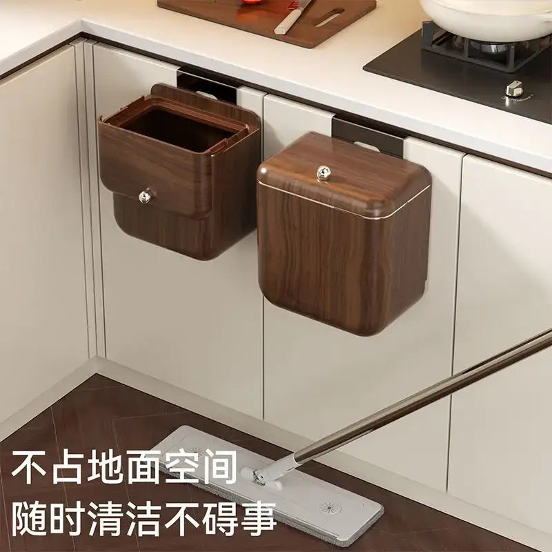 Two decorbites antique style wall-mounted kitchen trash cans with wood grain finish and metallic latches