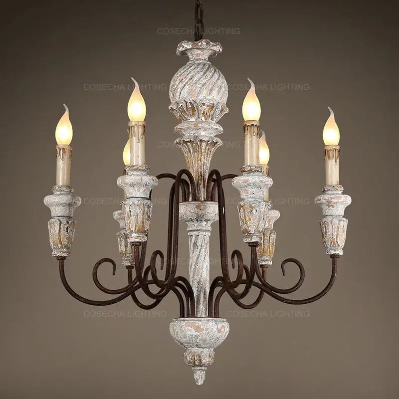 Decorbites antique white wooden chandelier with distressed white and gold finish ornate glass holders and wrought iron arms