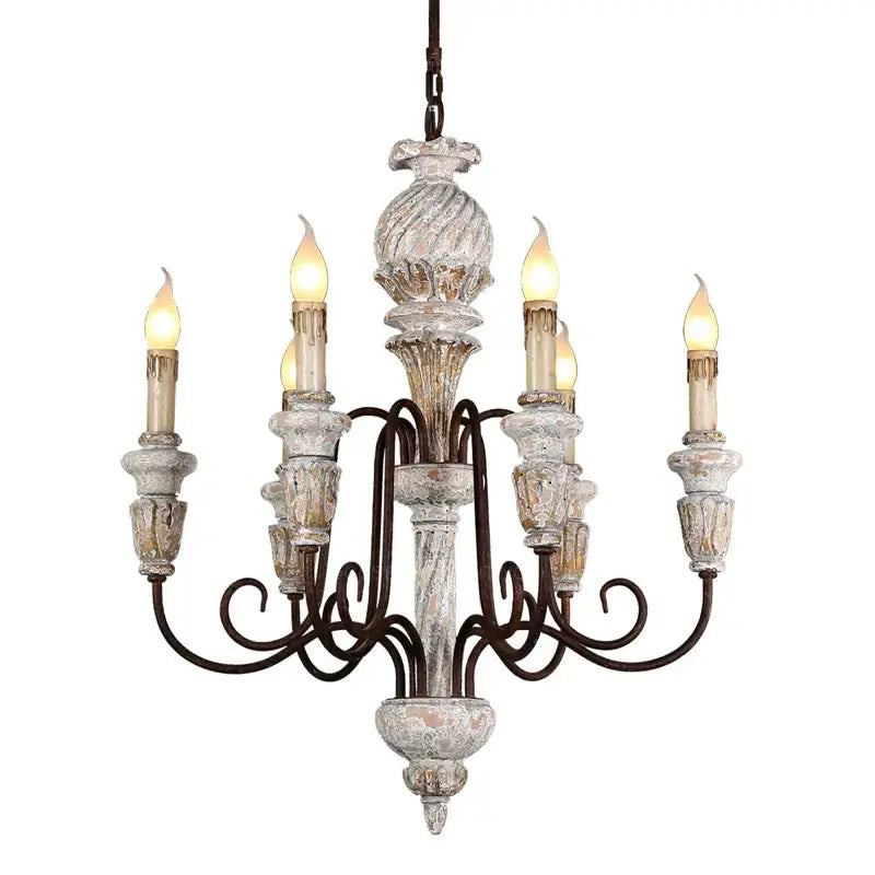 Decorbites antique white wooden chandelier with distressed white and gold finish and ornate wrought iron arms holding candle bulbs