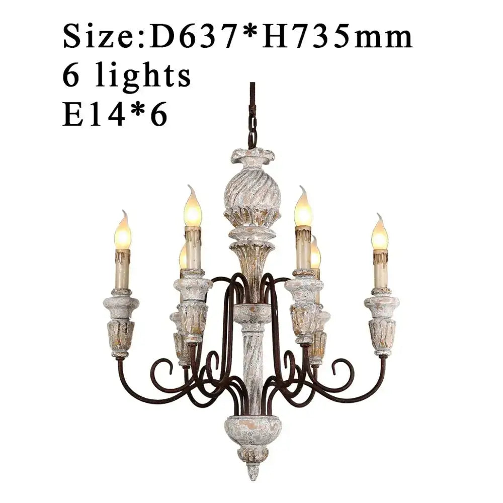DecorBites antique white wooden chandelier with six candle-style lights and dark metal scrollwork in elegant rustic design
