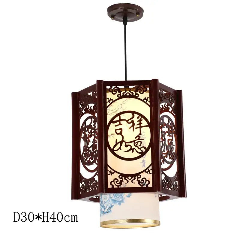 Dark wood hexagonal decorbites antique wood pendant lights with intricate carvings and blue floral fabric for dining room lighting