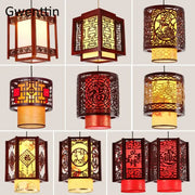 Decorbites antique wood pendant lights with intricate wooden frames and warm yellow red panels for dining room decor