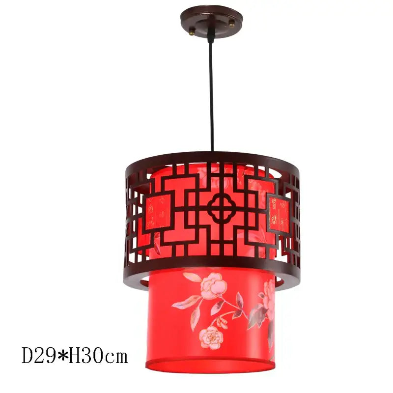 Red cylindrical pendant light with dark brown metal frame and floral glass shade from decorbites antique wood pendant lights
