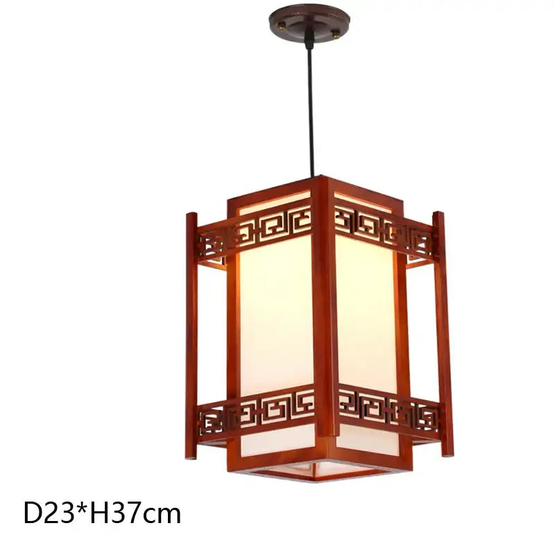 A warm-toned DecorBites antique wood pendant light with reddish-brown Greek key frame and off-white panels