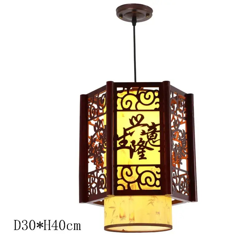 Decorbites antique wood pendant lights featuring dark brown wood with intricate carvings and glowing yellow glass panels