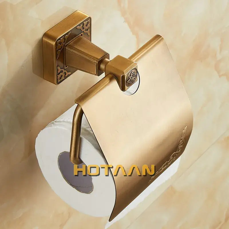 Brass toilet paper holder by decorbites featuring ornate floral detailing and a sleek modern design for bathrooms