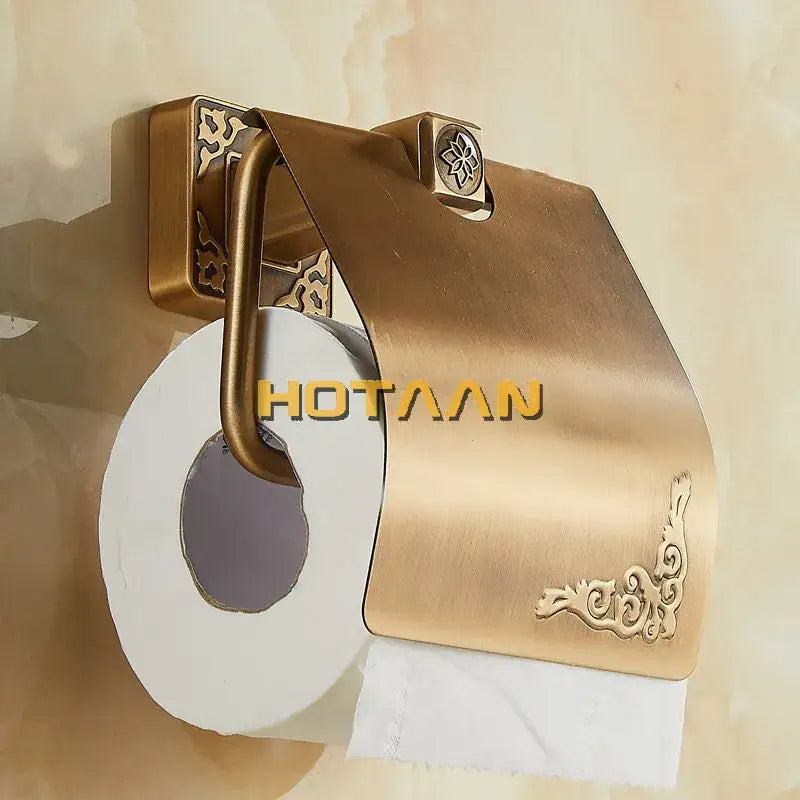 DecorBites™ antiqued brass toilet paper holder with ornate floral and scrollwork detailing classic paper holder