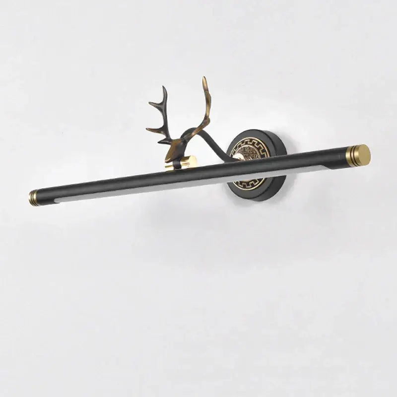 Black and gold decorbites antler deer-head mirror light sconce with sleek elongated bar for bedroom and bathroom use