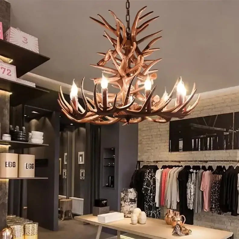 DecorBites antler branch ceiling chandelier with rustic bronze finish and multiple lit bulbs for elegant lighting