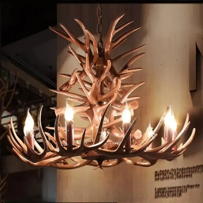 Decorbites antler branch ceiling chandelier with rustic warm-toned finish and candle-style bulbs for indoor use