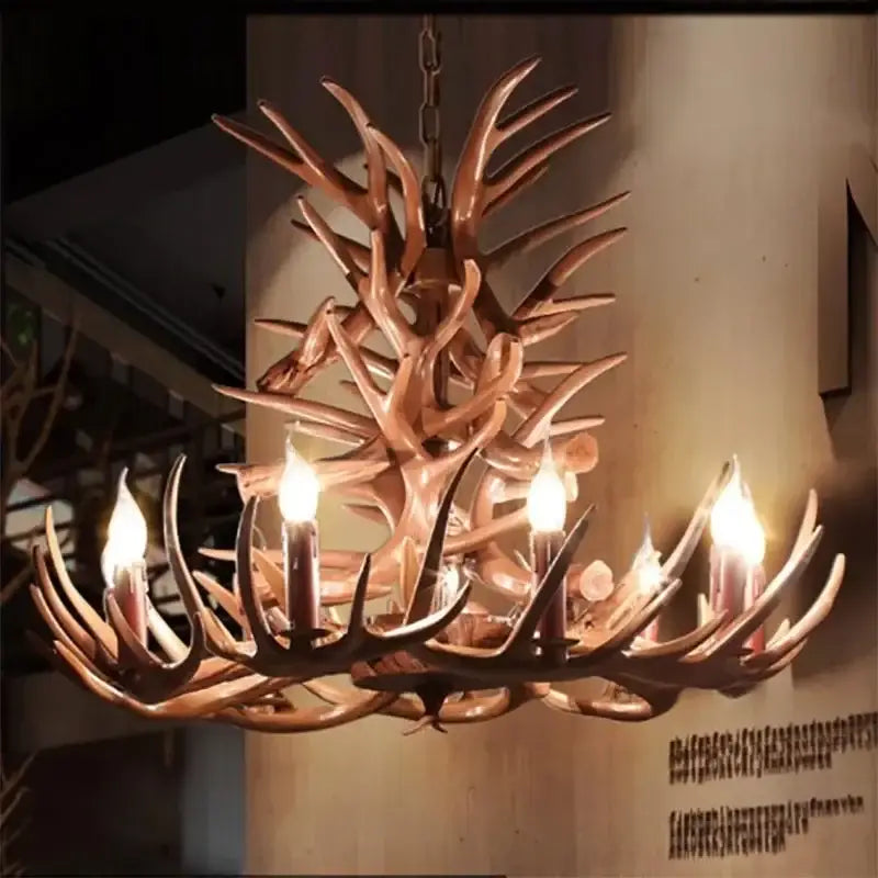 Decorbites antler branch ceiling chandelier with rustic warm-toned finish and candle-style bulbs for indoor use