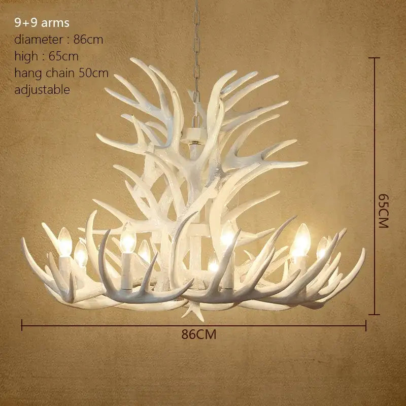 White antler chandelier with 9+9 arms featuring warm lighting and rustic design by decorbites antler chandelier