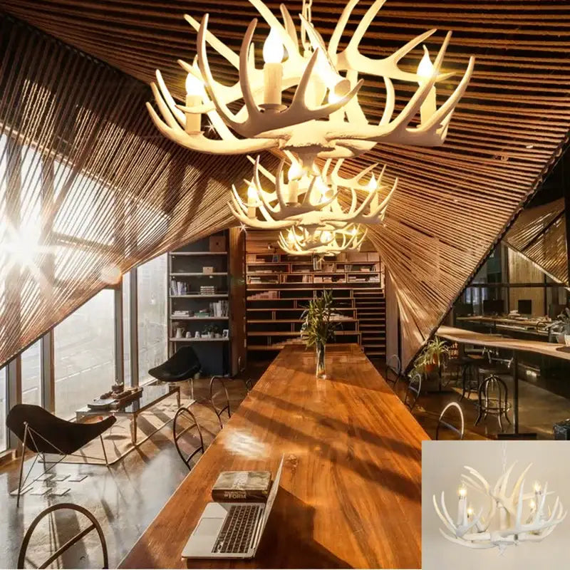 DecorBites antler chandelier with resin deer horn pendant lighting features multiple candle-style bulbs in a light finish