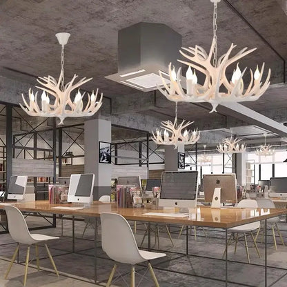 White antler pendant chandelier with multiple candle style bulbs for industrial home decor by decorbites antler pendant