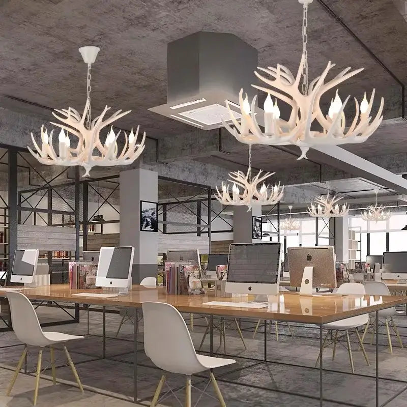 White antler pendant chandelier with multiple candle style bulbs for industrial home decor by decorbites antler pendant