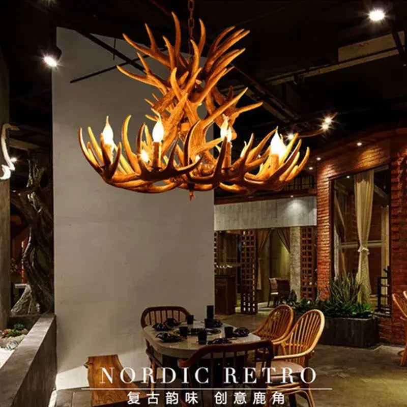 Decorbites antler pendant chandelier with warm golden brown finish and intricate branching design for home decor
