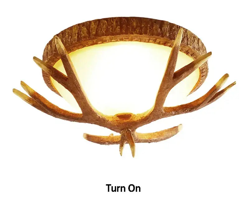 Rustic brown DecorBites antler resin glass ceiling light with tree-ring base and warm white illumination for home decor