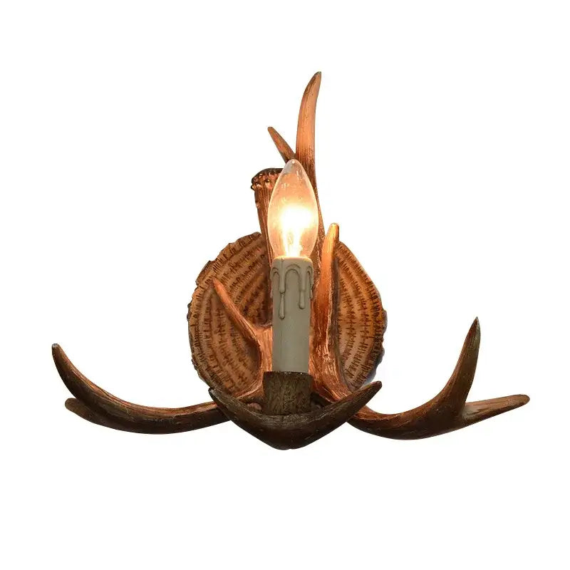 Decorbites antler resin wall lamp with warm candle bulb nestled in rustic brown copper-toned antlers for living room decor