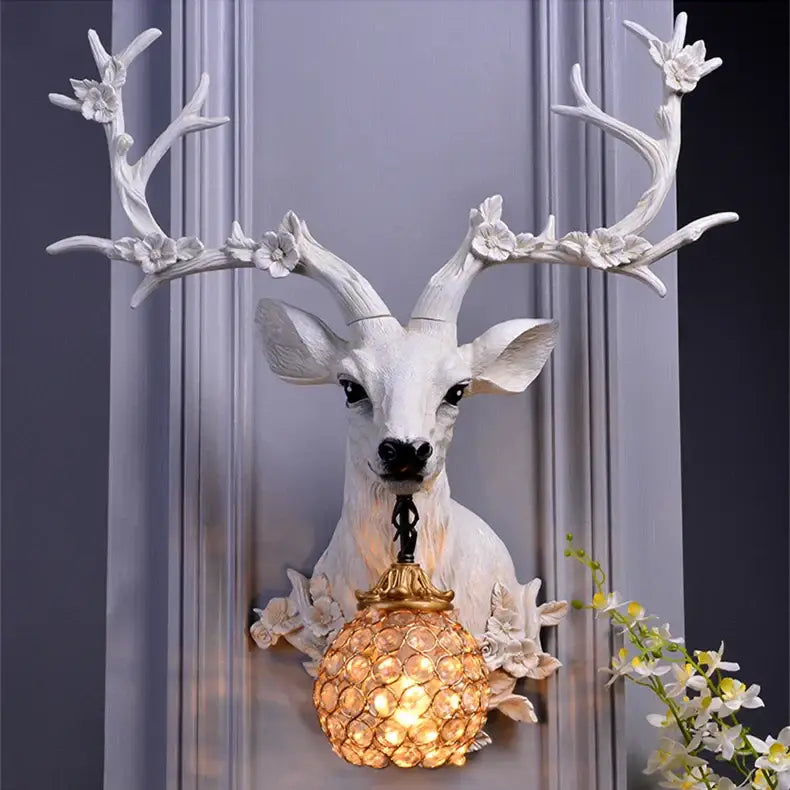 DecorBites antler wall lamp white resin deer head with ornate flower antlers and golden crystal globe wall lamp