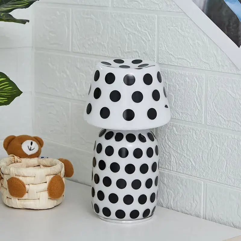 White ceramic DecorBites Apollo Mushroom glass table lamp with black polka dots for bedside night light use