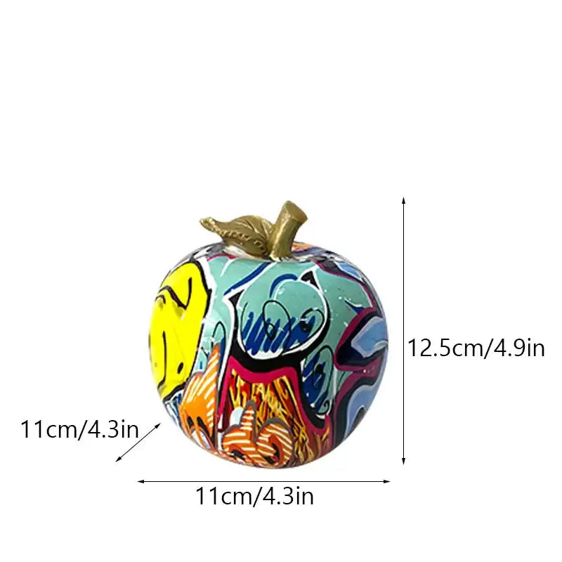 Vibrant decorbites apple figurines art ornament with golden stem and bold yellow teal orange red patterns for home office decor