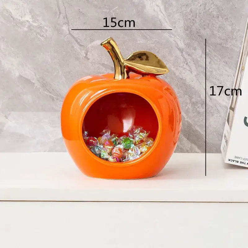 Vibrant orange decorbites apple hollow ceramic candy jar with shiny gold stem and leaf for home decor storage