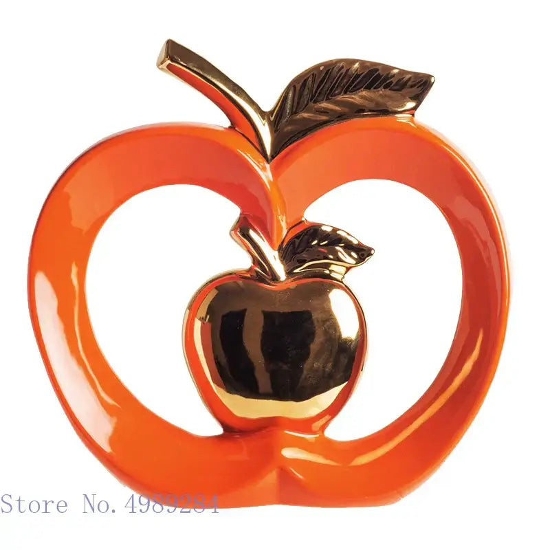Shiny orange ceramic apple hollow candy jar with gold metallic center and leaf accents by DecorBites apple hollow