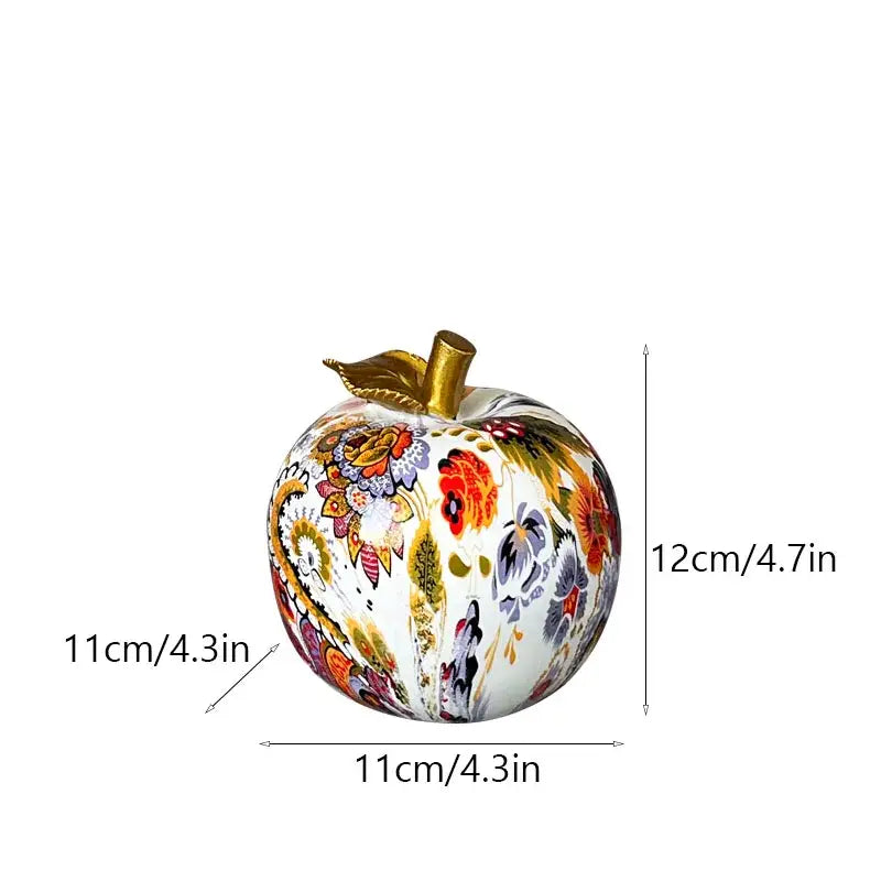 Decorbites apple resin figure decorative ornament with glossy white base and vibrant floral paisley patterns gold stem
