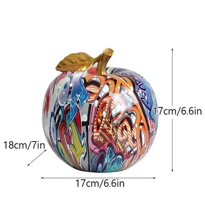 Vibrant decorbites apple sculpture resin ornament in graffiti style with glossy finish and golden leaf stem for modern decor
