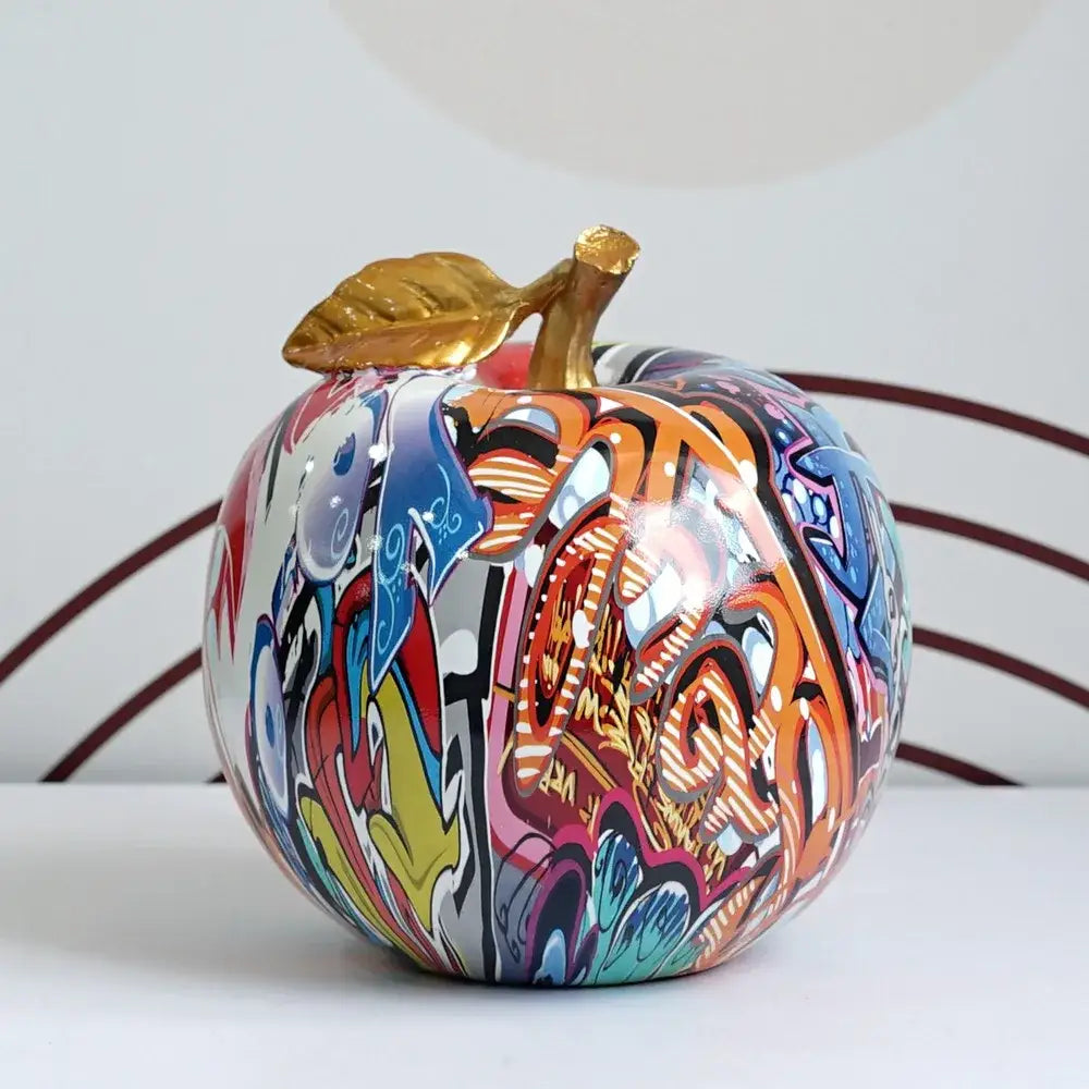 Decorbites apple sculpture vibrant graffiti-painted ceramic apple with golden stem and leaf sculpture resin ornament