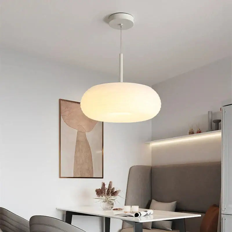 Modern white decorbites apple shape ceiling chandelier with rounded glass shade and minimalist metal fixture for bedroom and kitchen