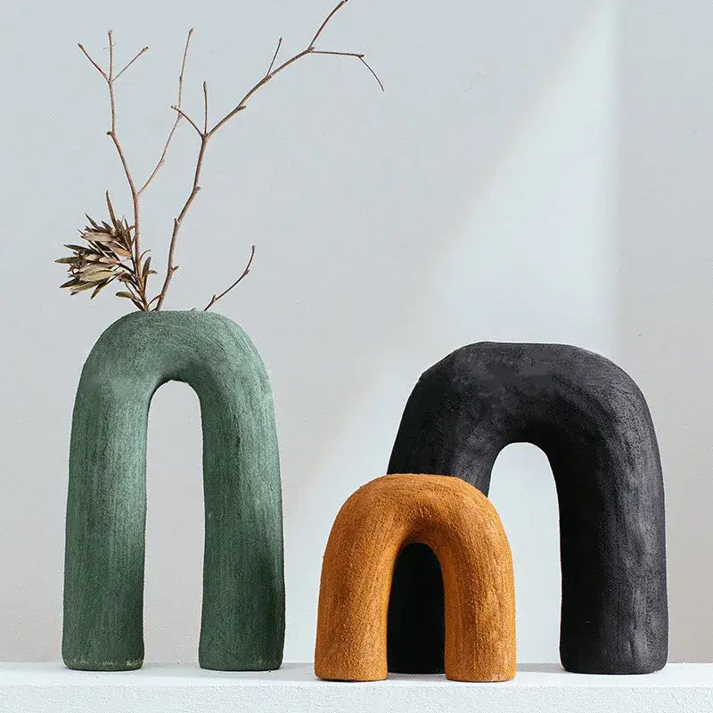 Three abstract arched ceramic vases in matte green orange and black decorbites arc ceramic vase for home decor
