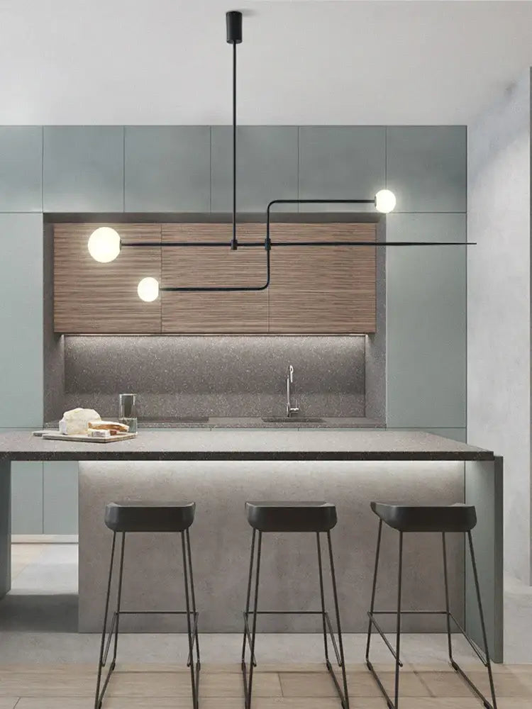 Modern black metal pendant light with three spherical white bulbs in decorbites arc line chandelier for living spaces