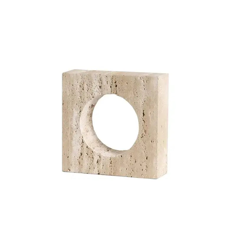 Beige textured stone block with a central circular cutout decorbites arch stone geometry ornament for modern decor