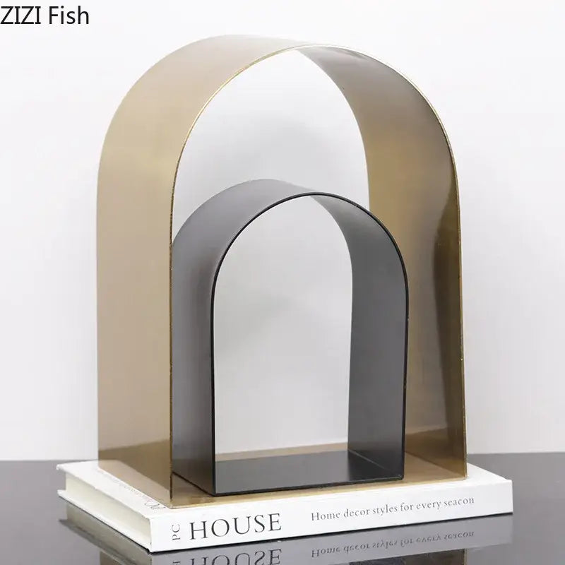 Modern metallic arch bookend with gold and black finish featuring clean lines and minimalist design for decorbites arches geometry desk decoration