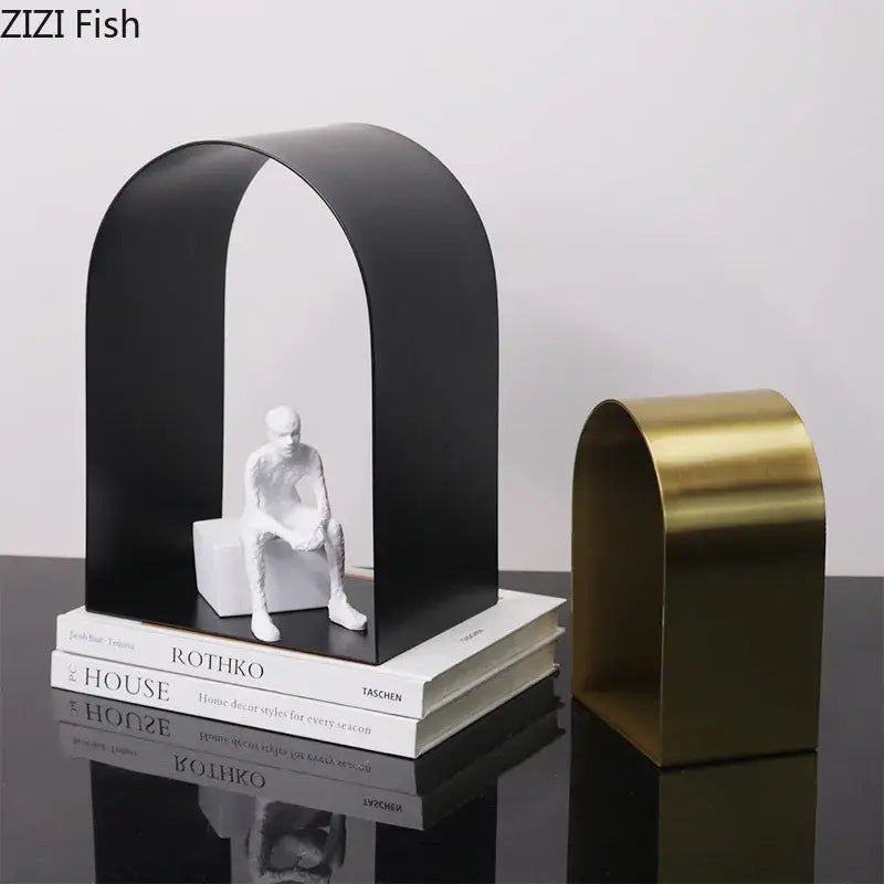 Black metal decorbites arches geometry desk bookend featuring a white sculpted figure for modern geometry desk decoration