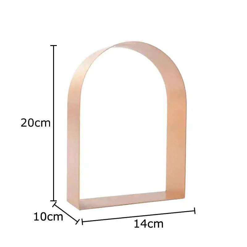 A sleek rose gold decorbites arches geometry arched shelf 20cm tall minimalist geometry desk decoration