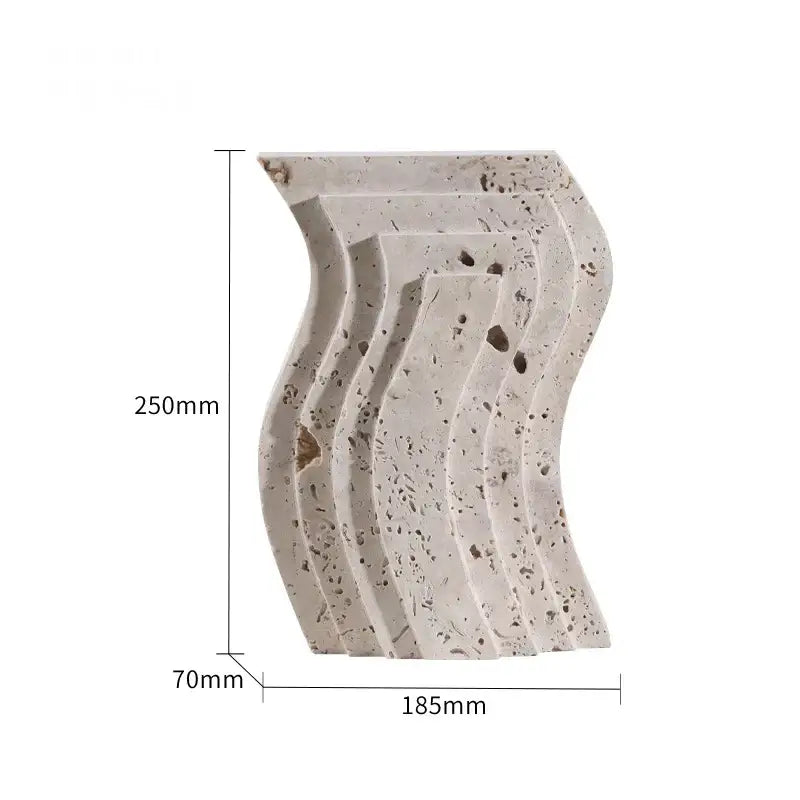 A sleek light gray stone planter with wavy layered design and natural speckles in a decorbites archway shape travertine sculpture