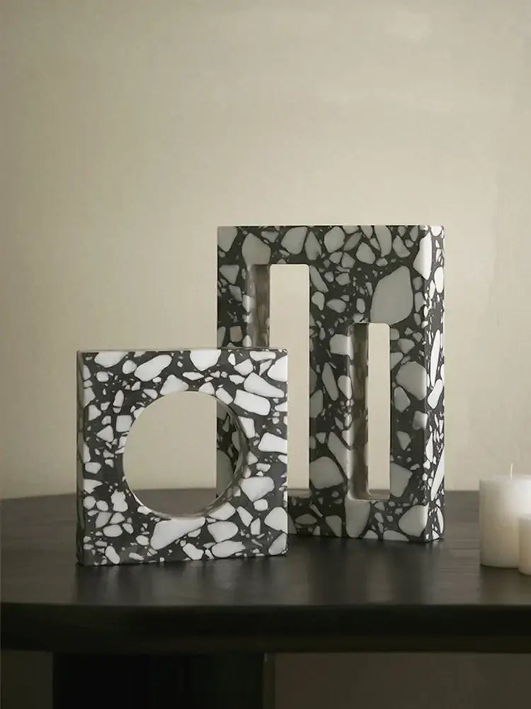 Black and white terrazzo sculpture with rectangular cut-out frames in the DecorBites archway terrazzo design for home decor