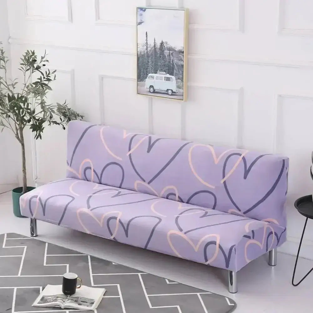 Lavender-colored decorbites armless futon sofa cover with stretchy elastic material and outlined hearts pattern in soft pink and dark purple